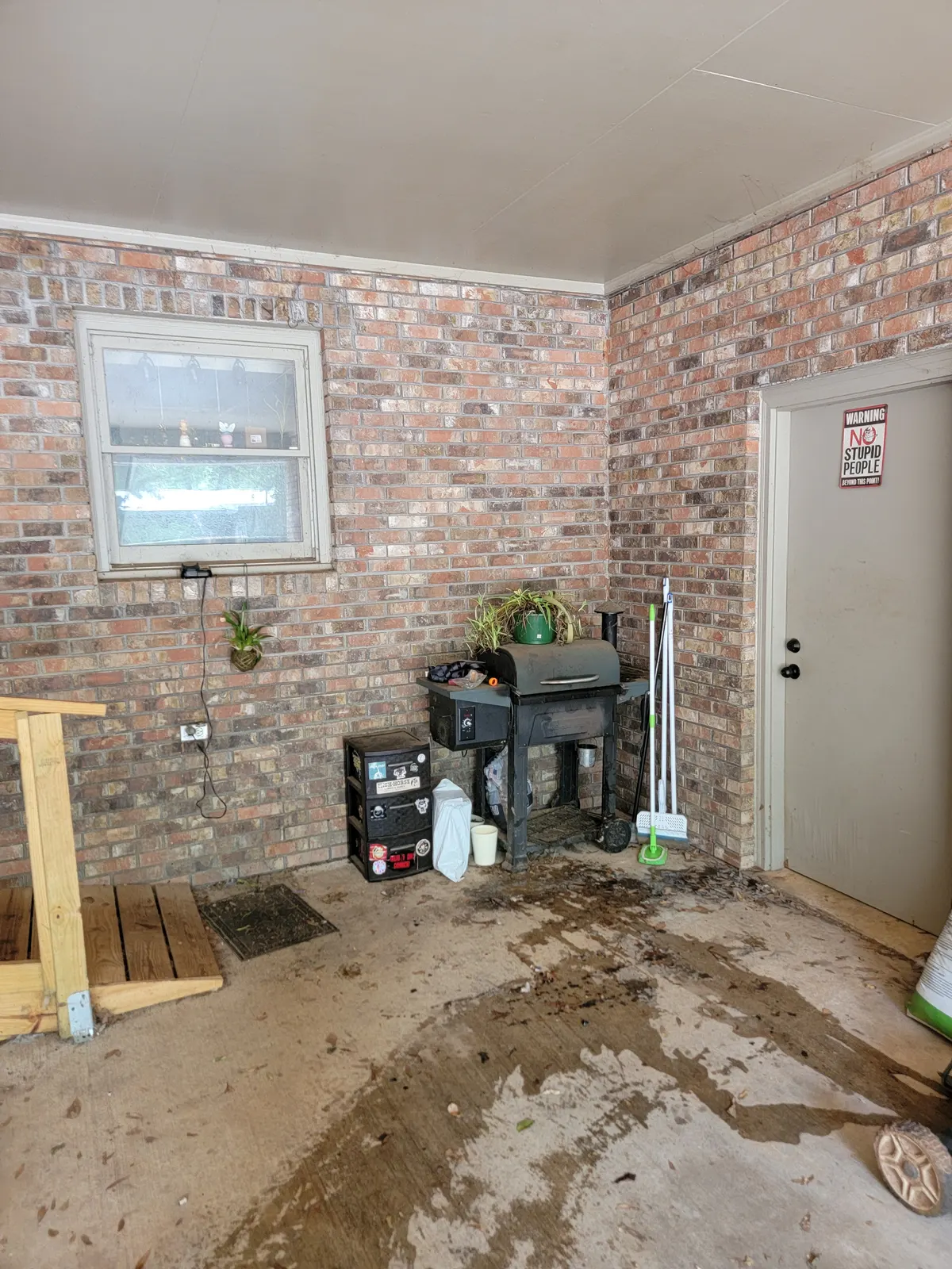 The same porch with the refrigerator removed
